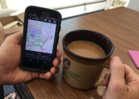 VCE biologist Jason Hill checks in on a satellite-tagged Upland Sandpiper that has spent the last week in between the runways at Baltimore Washington International Airport.